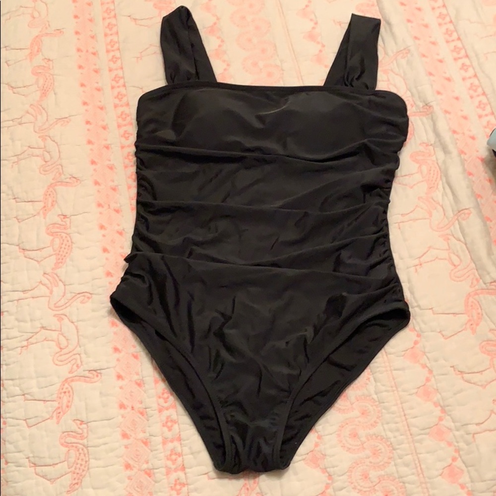 Black wide-strapped, one-piece bathing suit